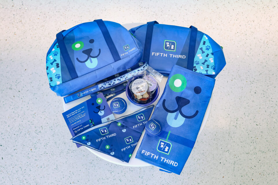 A display of the contents of the box of pawesome pet toys and swag