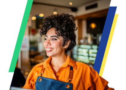 A woman leans back with her hands behind her head and relaxes after adding Extra Time to her Momentum checking account.